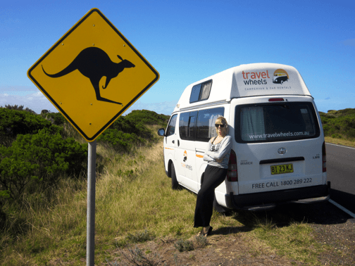 Used Toyota Hiace Campervan for sale with kangaroo sign by the roadside