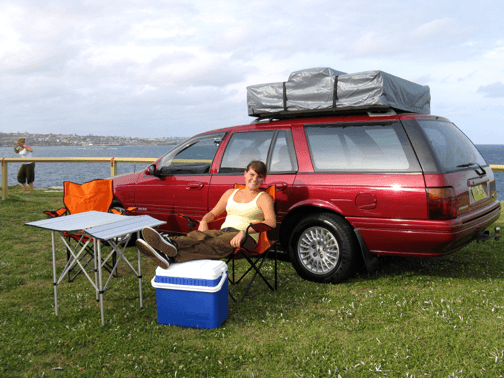 Picture of a used car for sale at the beach