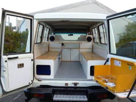 Bush camper for sale with custom build lounge/kitchen/bedroom