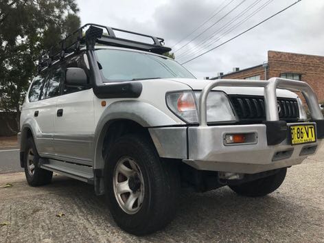 Toyota Prado for sale - front view with bullbars, rack and snorkel