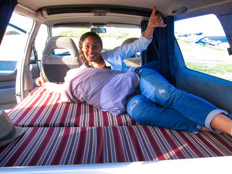 double bed inside Toyota Tarago Campervan for sale