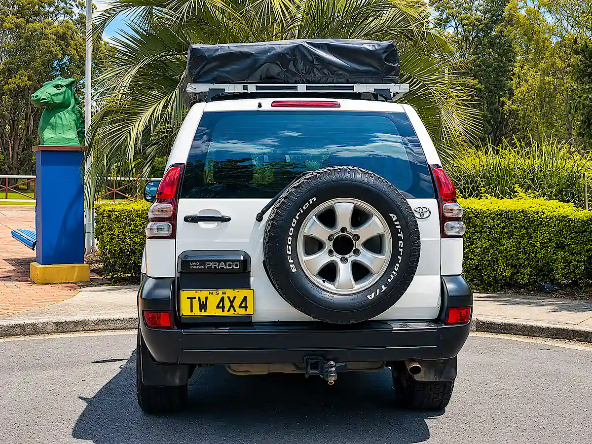 Used Toyota Prado for sale with roof tent - rear view with spare wheel