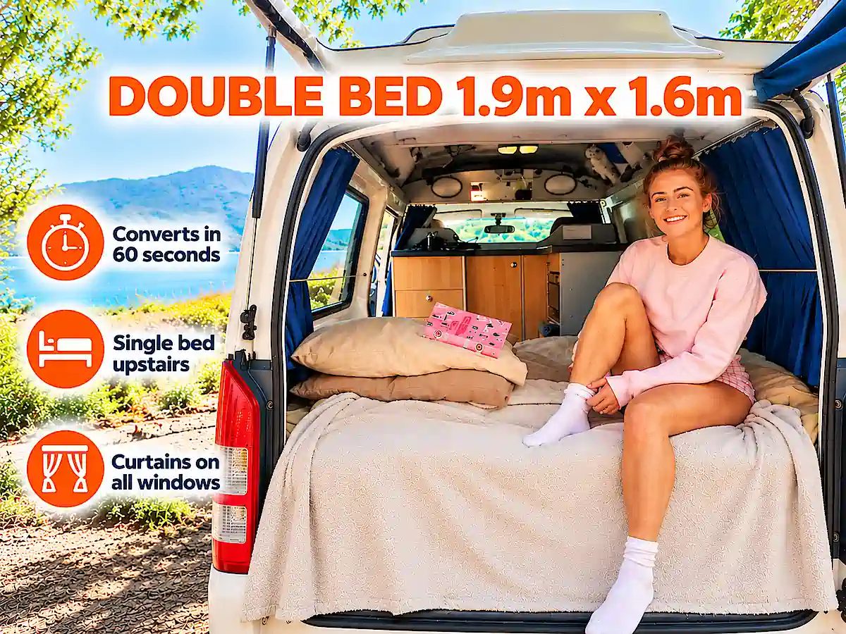 Toyota Hiace Campervan double bed 1.9m x 1.6m image with women in bed