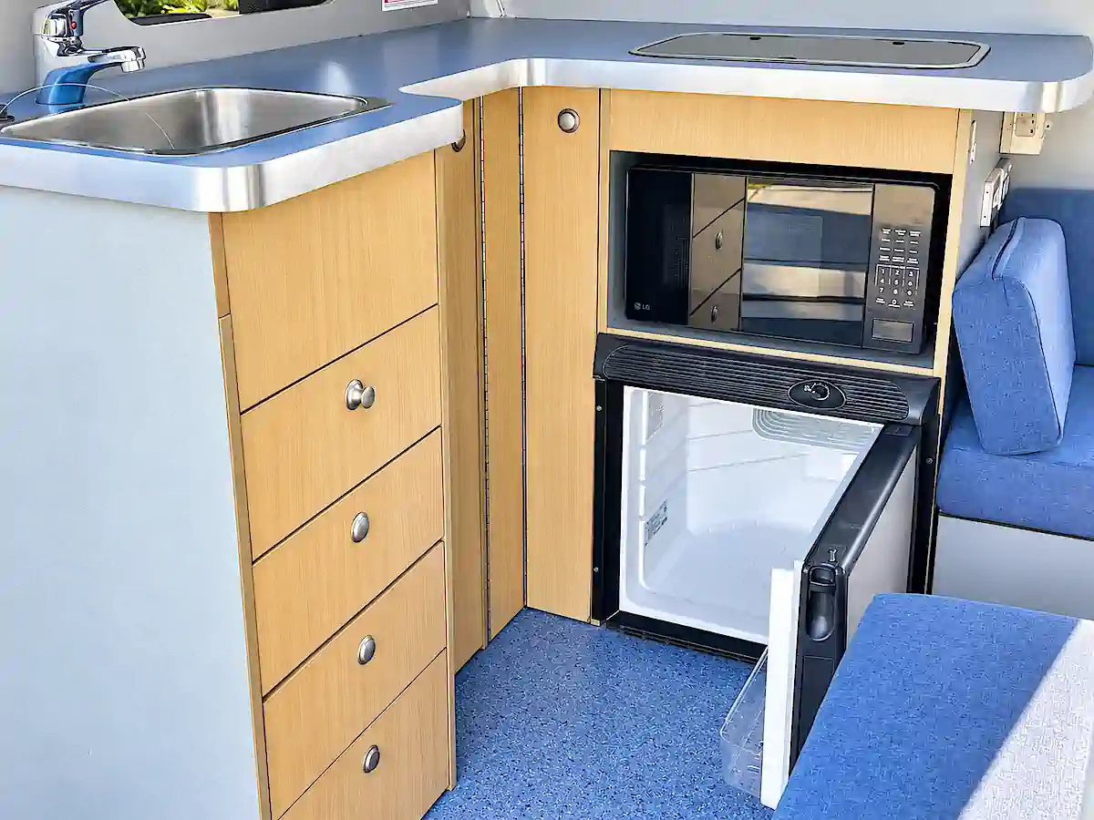 Toyota hiace campervans for sale - view of the kitchen inside the campervan