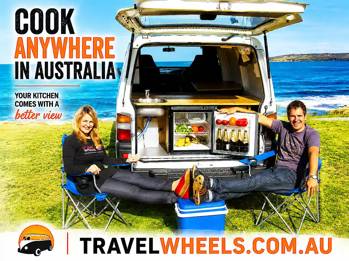 Two person campervan for sale with rear kitchen with fridge, cooker, sink and water tank