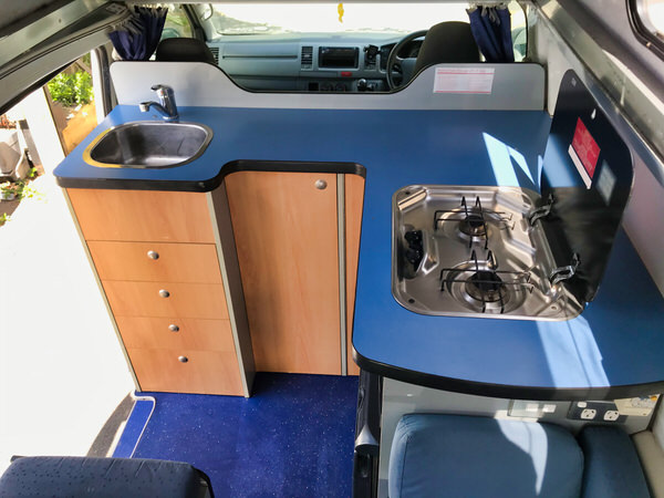 Toyota Hiace Ex-rental Campervan for sale - kitchen with sink, fridge and cooker