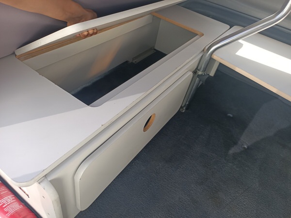 Useful storage under the benches in this campervan for sale