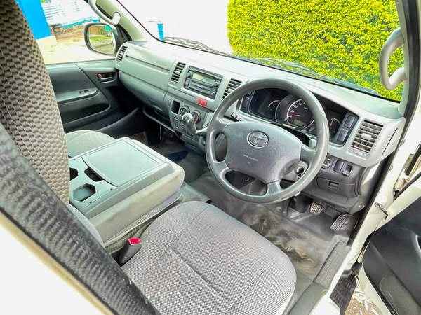 Ex-rental Toyota Hiace Campervan for sale in Sydney - photo showing the view from the drivers seat in front cab