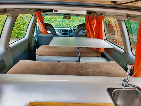 Ex-hire used small campervan for sale in Sydney - photo of the lounge area inside this campervan