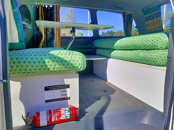 Photo of the comfortable lounge area inside our used Toyota 2 Person campervans for sale