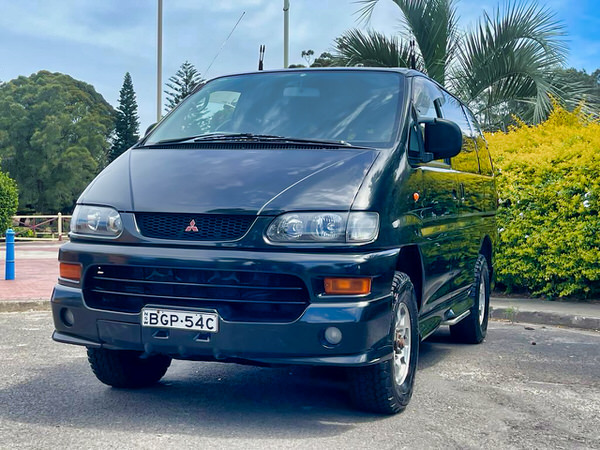 4x4 campervan conversion for sale in Sydney - photo showing the front passenger side angle view of this Mitsubishi Delica van