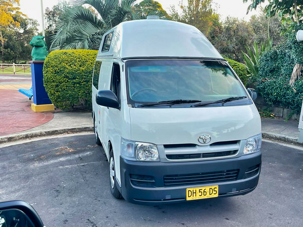 Used Campervan for sale in Sydney - Photo showing a Toyota Hiace Campervan from the front passengers side angle view
