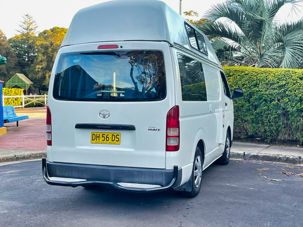 Used Campervan for sale in Sydney - Photo showing a Toyota Hiace Campervan from the rear drivers side angle view