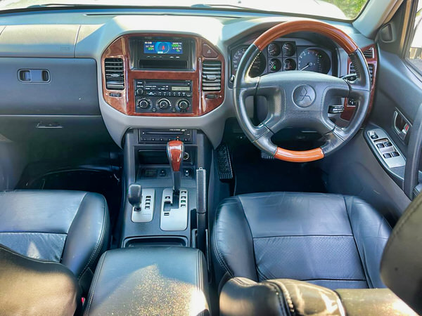 Mitsubishi Pajero for sale from Travelwheels Campervans - 2003 Automatic 3.5L model - photo showing the view sitting in the driver seat looking forward