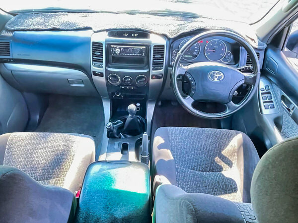 Used 4x4 for sale - Mitsubishi Pajero Automatic Diesel 2010 model in great condition. Comes with removable double bed and all the camping gear you need - Photo showing the view sitting in the driver seat looking out of the windscreen