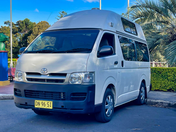 Toyota Hiace hitop campervans for sale in Sydney - Photo showing the front passenger side angle view - campervan has not stickers and in very good condition