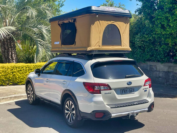 Roof Top Tent Camper for Sale in Sydney – Model shown is a Subaru Outback Automatic Station Wagon AWD with Roof Top Tent - photo shows the rear driver side angle view with the roof top tent open to get a good night sleep