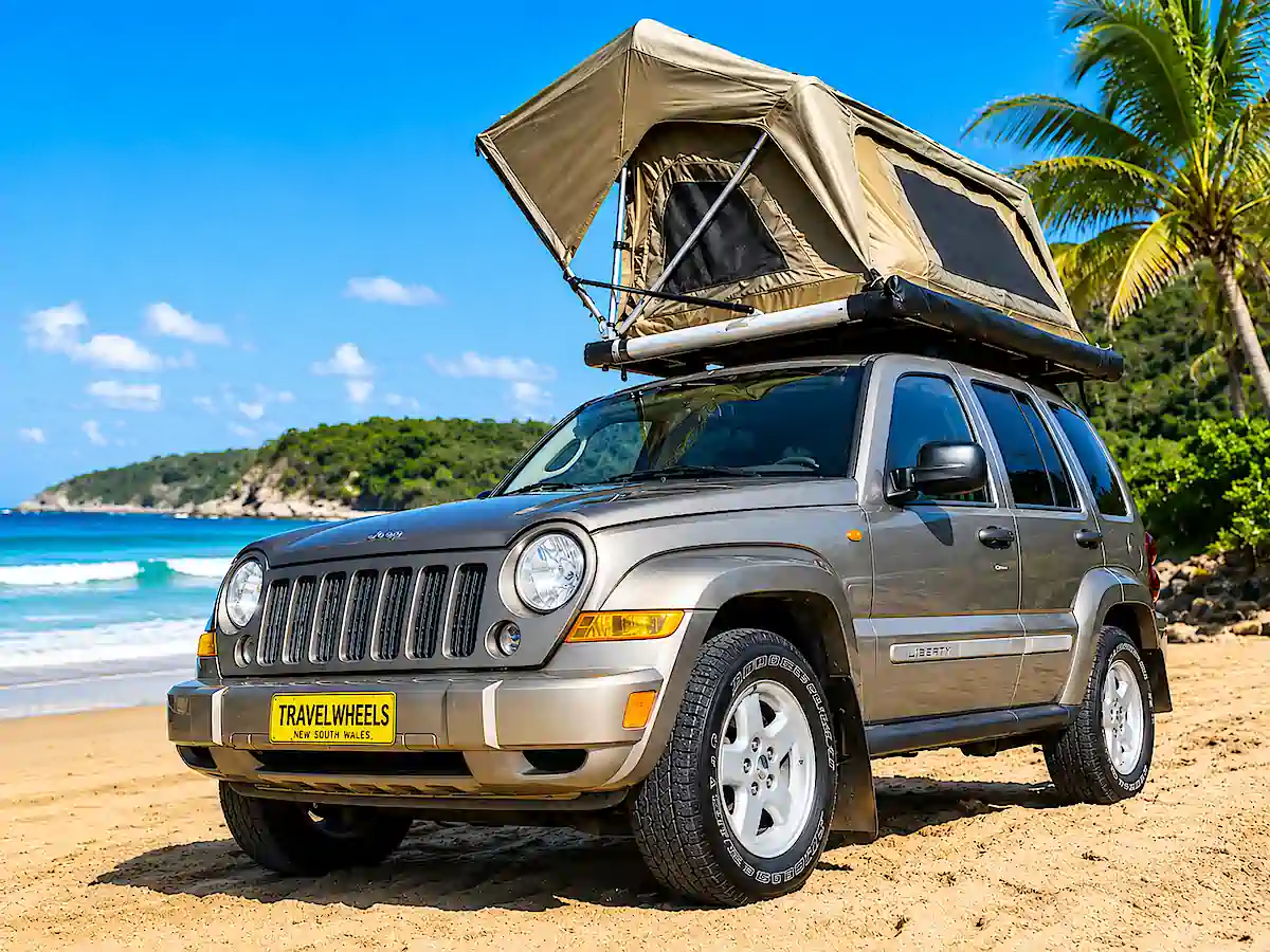 Used Jeep for sale with roof top tent open at the beach