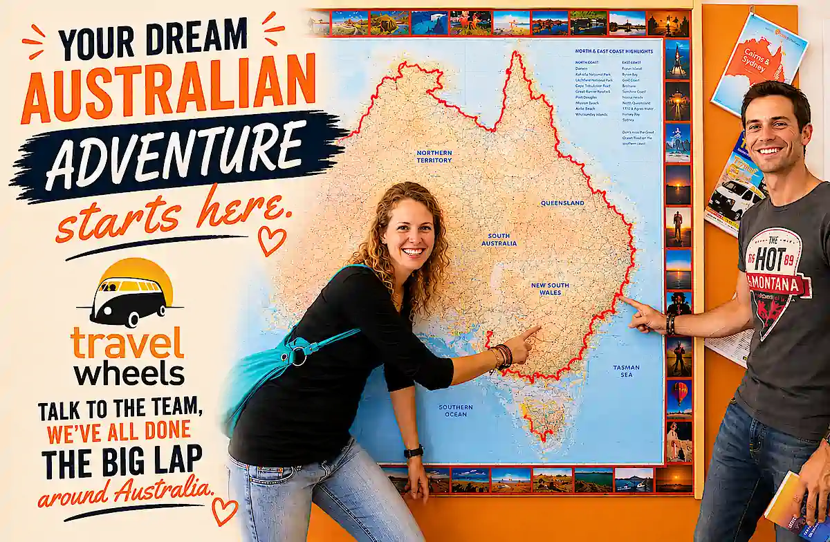 Travelwheels customers in front of our giant map of Australia planning their campervan trip using our detailed free route itinerary planners