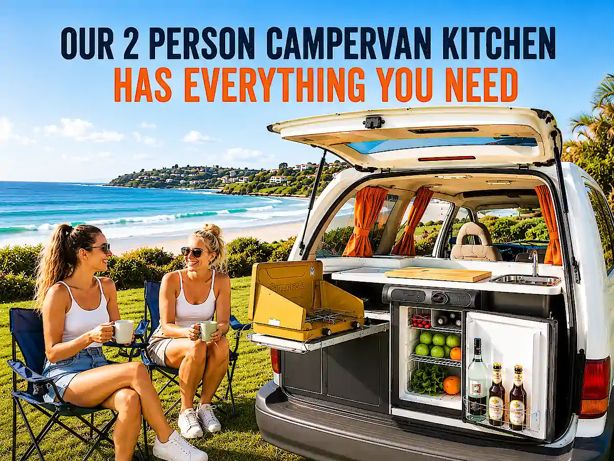 2 Person campervan for sale - rear kitchen with two women drinking tea in the kitchen