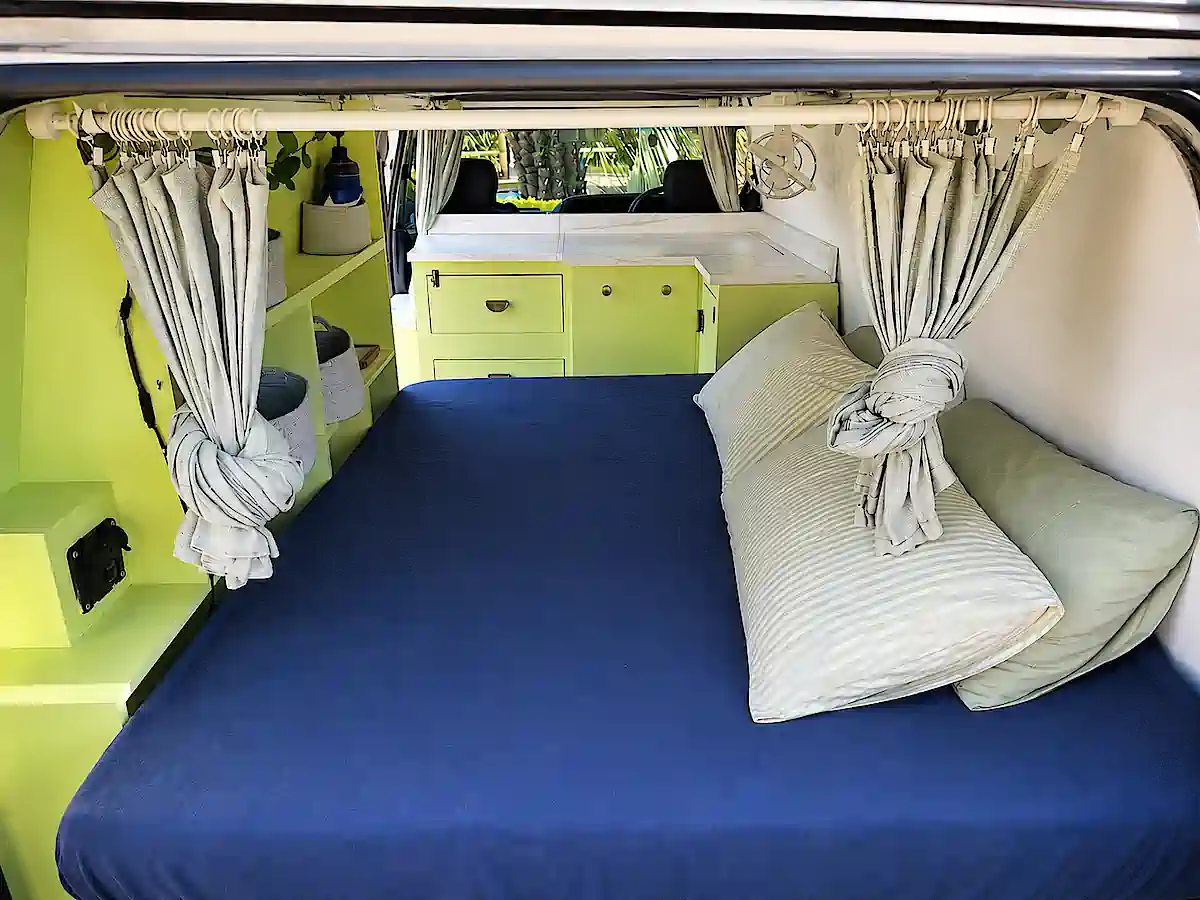 Toyota Campervan for sale in Sydney - comfortable double bed with curtains