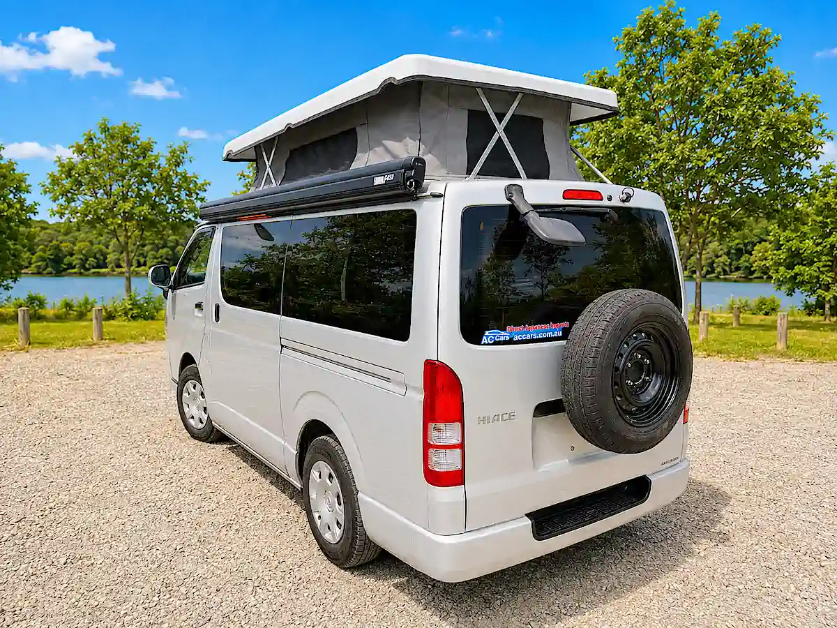 Toyota Pop Top Campervan for sale Travlewheels sydney - rear passsenger side view with Pop Top Open position