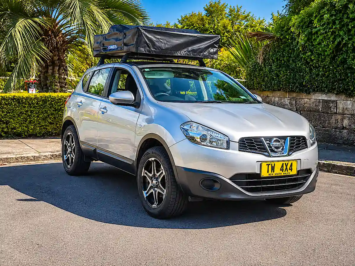 Used SUV for sale - Nissan Dualis - front driver view with roof tent closed