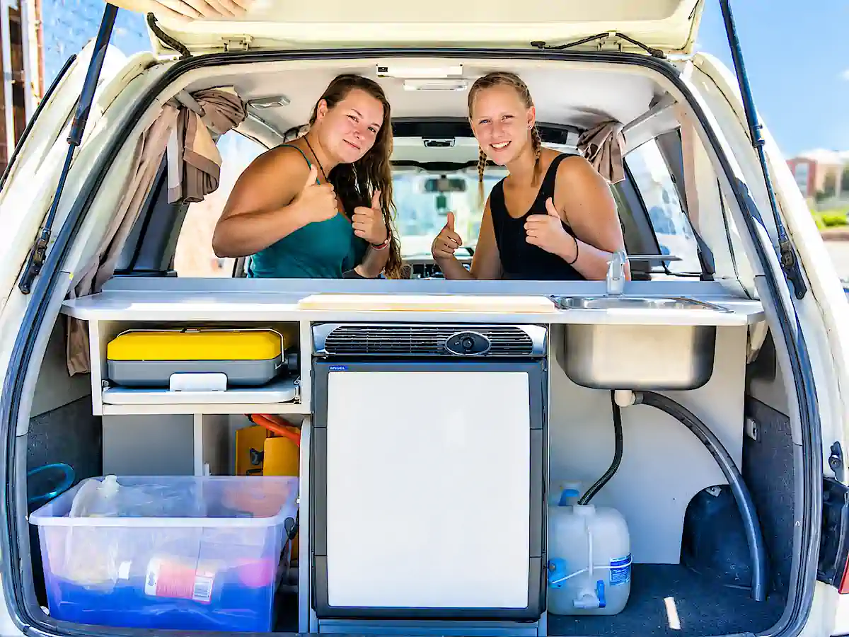backpacker campervan for sale - Rear kitchen with fridge cooker and sink ready to travel Australia