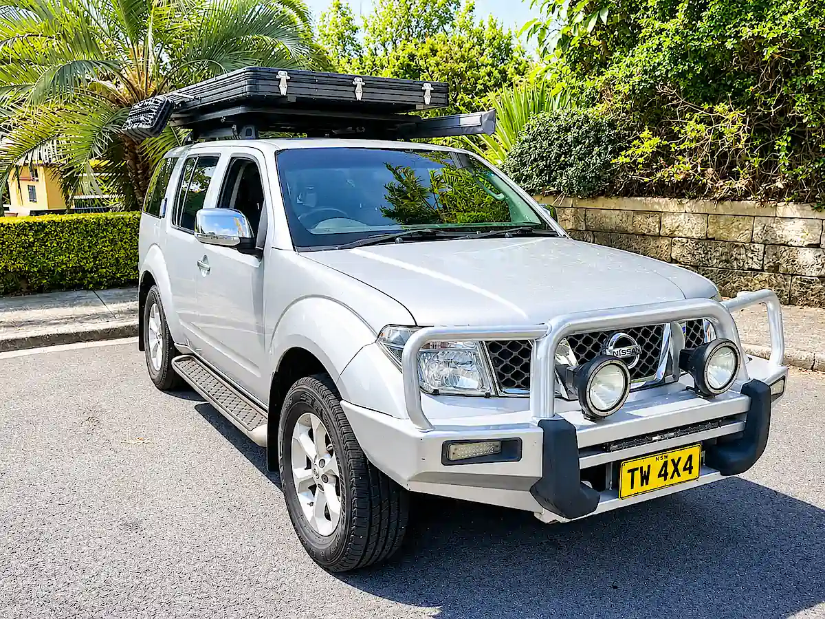 Used Bush Camper for sale with Roof Tent in close position at Travelwheels Campervans Sydney
