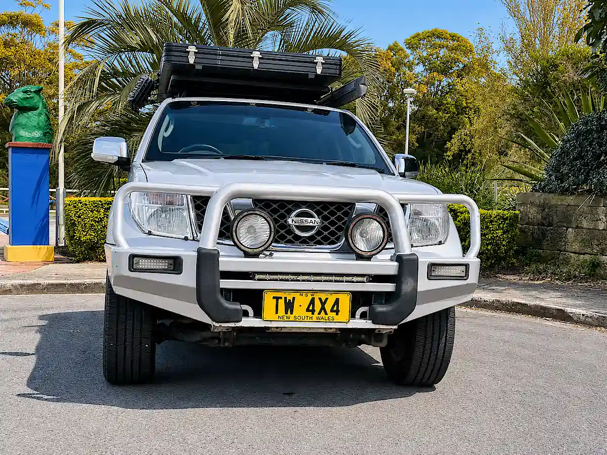 Used Bush Camper for sale with Roof Tent - front view with bull bars
