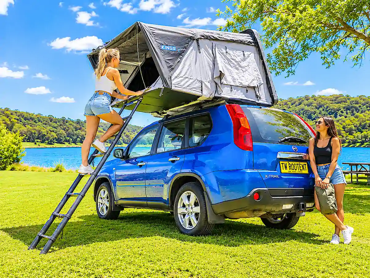 Backpacker 4x4 for Sale in Sydney - women climbing into roof tent