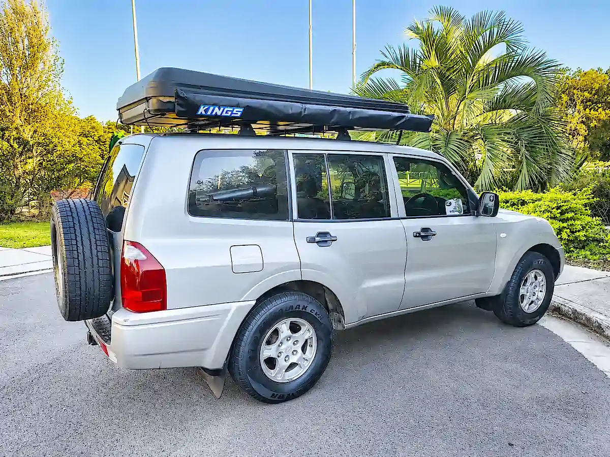 Used Mitsubishi 4x4 for sale - rear side driver roof tent closed